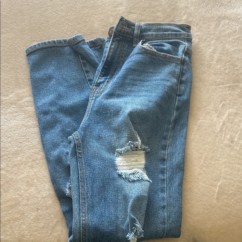 Distressed Blue Jeans
